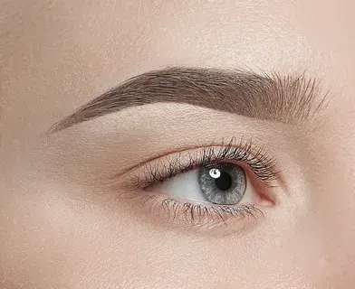 A precisely sculpted, HD-defined eyebrow framing the eye